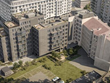 Квадрия состоит из 2 стилистически разных зданий, объединенных входной группой.